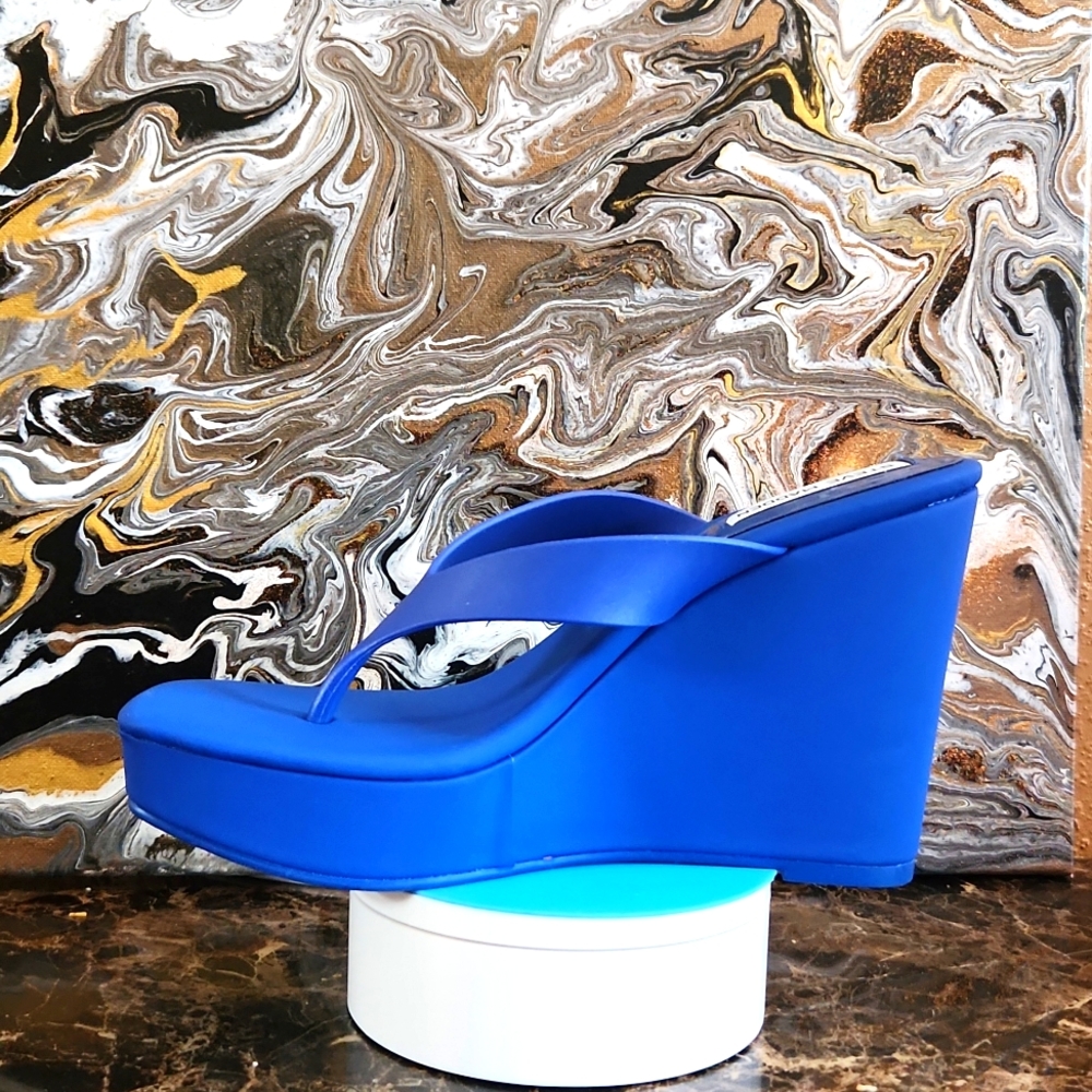 Blue wedge sandals by Steve Madden